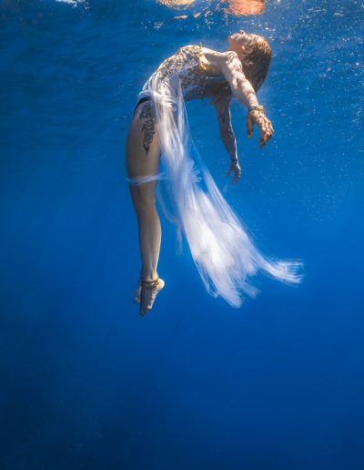 underwater portrait of a woman in the ocean