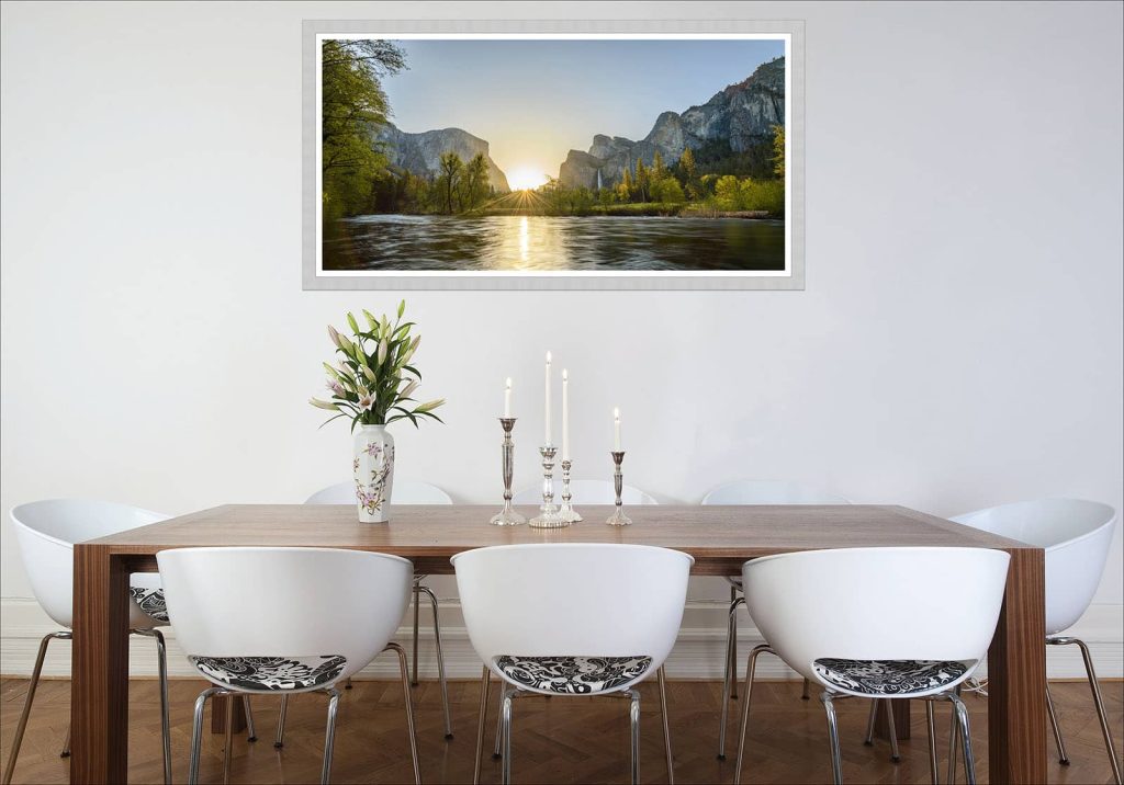 Framed sunrise photo of Yosemite National Park hanging on the dining room wall