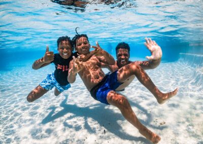 Family pool portraits underwater