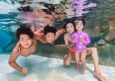 Family pool portraits underwater