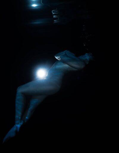 Underwater boudoir portrait of a woman