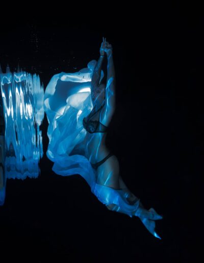 Underwater boudoir portrait of a woman