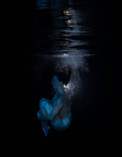 Underwater boudoir portrait of a woman