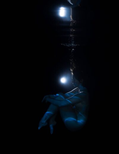 Underwater boudoir portrait of a woman