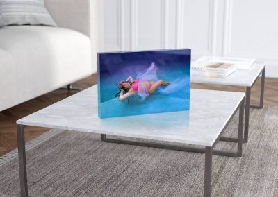 A pregnant woman during an underwater maternity photoshoot in Cairns is printed on an acrylic block.