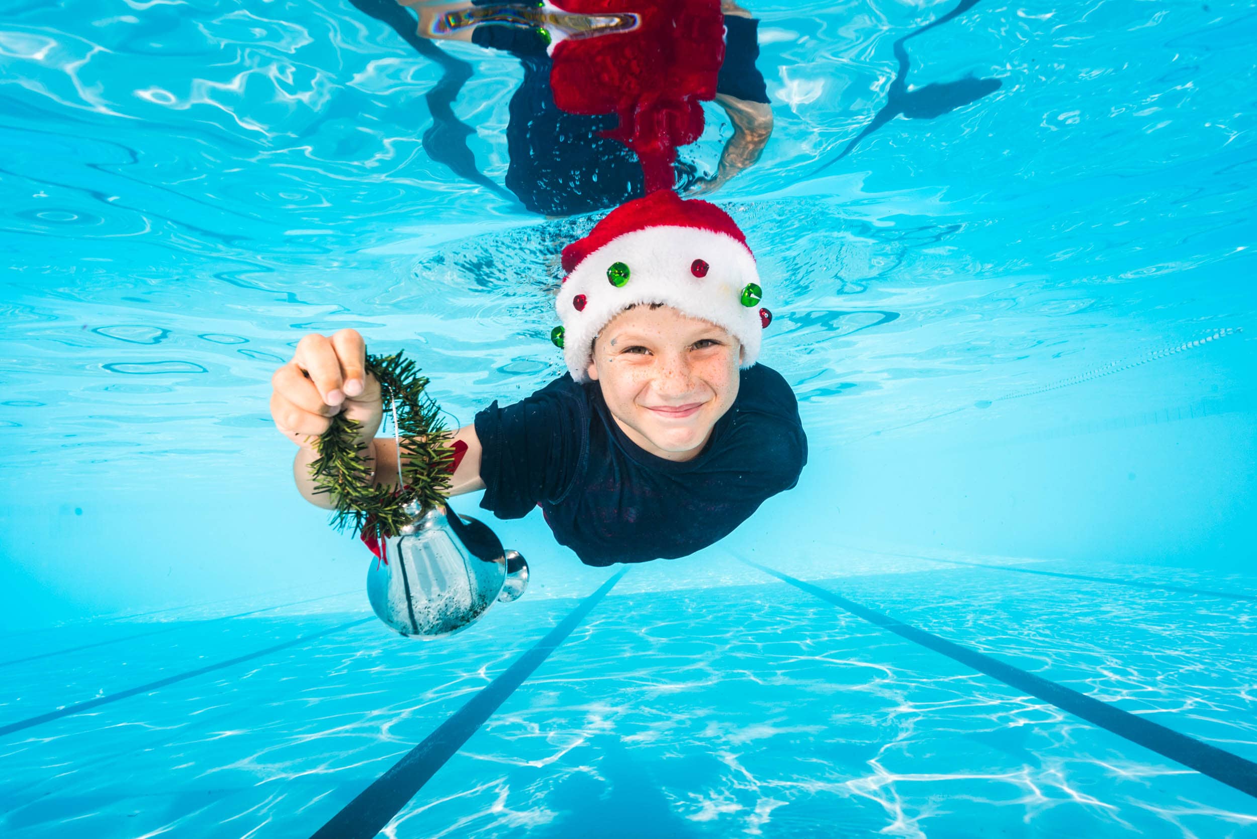 Underwater Christmas portrait of a child