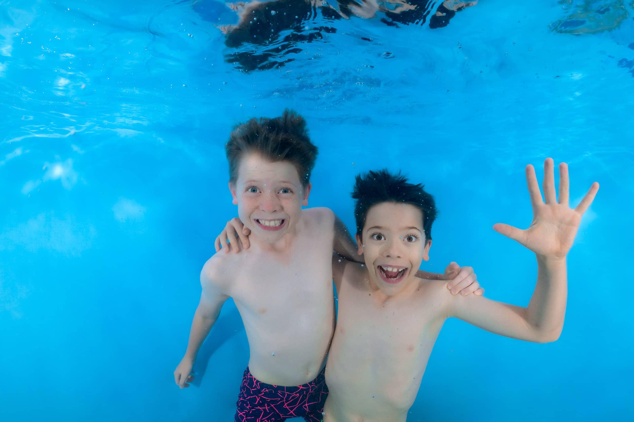 Underwater photo of a child from a swim school photo day.