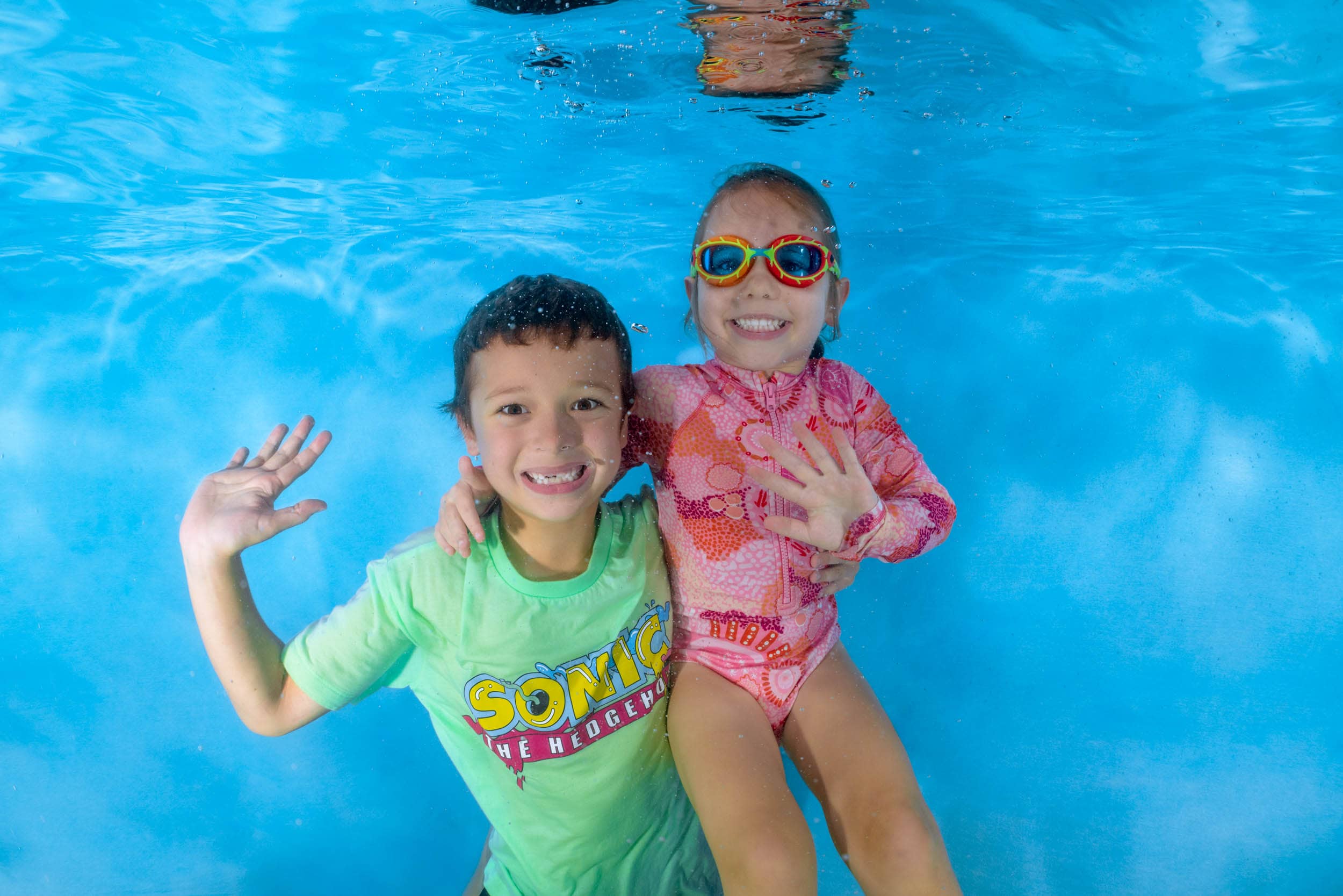 Underwater photo of a child from a swim school photo day.