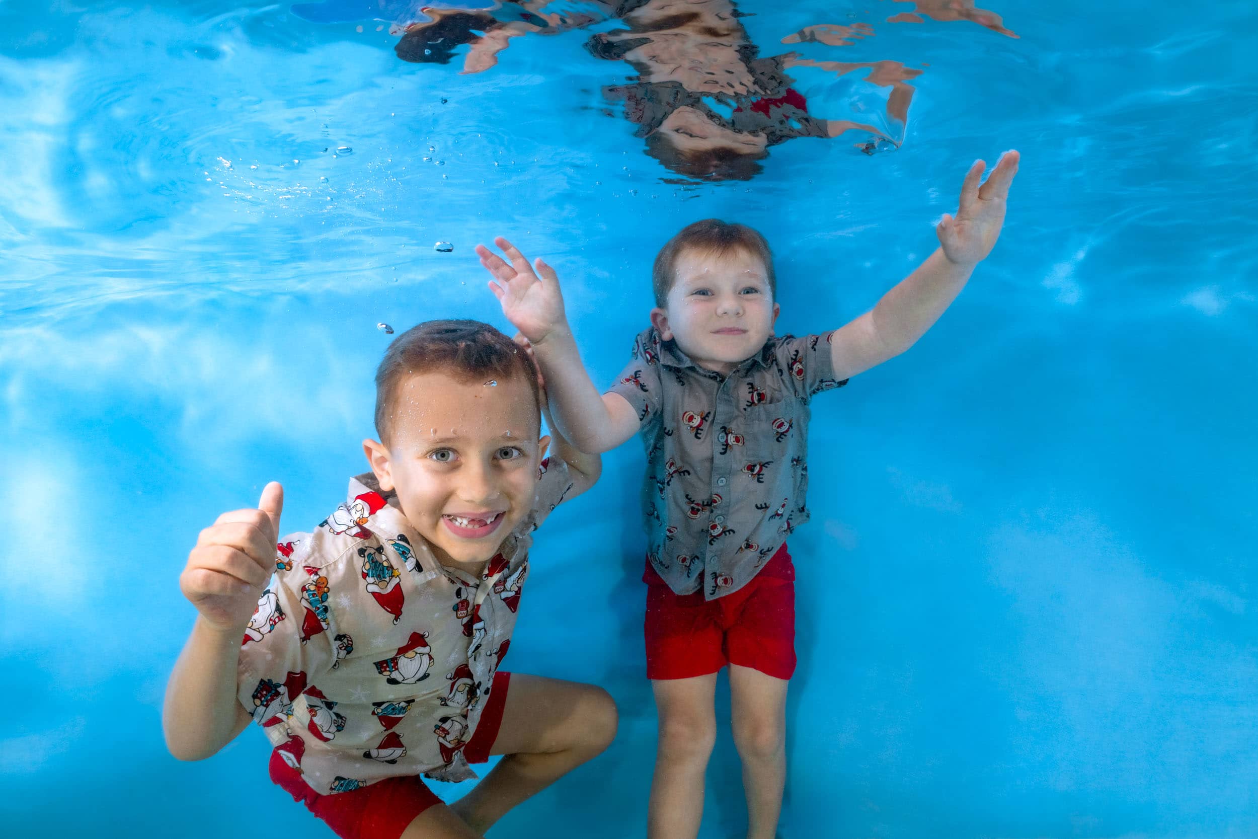 Underwater photo of a child from a swim school photo day.